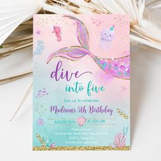 a pink and blue birthday party with a mermaid theme