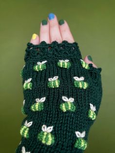 "Dark Green Hand Knitted Fingerless Gloves With Green Bees, In Shades Of Green, Green Bees, Embroidery, Gloves & Mittens, Gift Ideas, For Her, Winter Accessories, Anniversary Gift, Gift For Woman, Hand Crocheted Lace, Handmade Accessories, For Women, Women, Handmade Lace Gloves, Cozy, Elegant. These unique hand knitted accessory can be a wonderful accent to Your clothes :) Gloves are: length: 18 cm (7,25 inches); circumference of the wrist: 17-19 cm (6.75-7.5\"). fiber composition: 60% wool, 40% Winter Gift Crochet Knitting Pattern, Winter Crochet Knitting Pattern For Gift, Winter Crochet Knitting Pattern, Winter Gift Knitting Pattern, Knitted Patterns For Winter Gifts, Green Gloves Aesthetic, Goblincore Gloves, Crochet Flower Fingerless Gloves, Green Fingerless Gloves