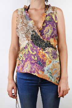 Floral asymmetrical blouse In great condition Tag: Labod Material: 68% cotton, 32% silk Size: Eu 42, medium, large bust 41 cm = 16 in length 56 cm = 22 in waist 40 cm =15,5 in Thank you for your visit! View more products: https://www.etsy.com/shop/VintageSeventhHeaven Feel free to contact me if you have any questions. Orange Silk Tops For Spring, Orange Silk Top For Spring, Spring Orange Silk Top, Sleeveless Silk Beach Top, Sleeveless Silk Tops For Beach, Sleeveless Silk Tops For The Beach, Brown Silk Tops For Spring, Brown Silk Top For Spring, Spring Brown Silk Top