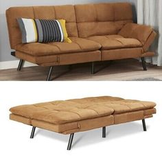 a brown couch and ottoman with pillows on the top one is in front of a window