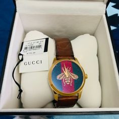 Gucci Unisex Swiss Le March Des Merveilles Brown Leather Strap Watch 38mm Ya126451 Gucci Apple Watch Band, Charm Bracelet Watch, Gucci Bracelet, Floral Watches, Brown Leather Strap Watch, Small Watch, Pink Watch, Bangle Watches, Gucci Watch