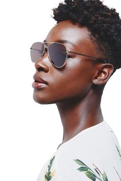 The 'Emma' metal frame is a finely executed fresh take on the classic aviator shape. The frames are constructed of expertly polished plated metal that are both lightweight and durable. The lenses are 100% protected against UV. The nose pads are adjustable and the temples are sculpted for maximum comfort. The iconic Monique Lhuillier signature is placed in the inner temple arm and both the inner and outer temple arm tip.Also available in Emma Black. Made in Japan. Modern Aviator Sunglasses With Metal Frame, Monique Lhuillier Bridal, The Nose, Monique Lhuillier, Metal Frame, Temple, Mens Sunglasses, Lenses, Japan