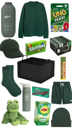 the contents of a green holiday gift set including socks, sweaters, and other items