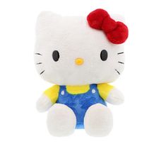 a hello kitty stuffed animal with a red bow on it's head and blue overalls