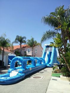 an inflatable water slide on the street