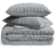 three pillows stacked on top of each other