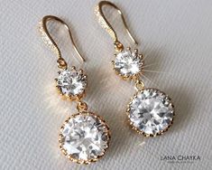 Crystal Cubic Zirconia Gold Chandelier Dangle Bridal Wedding Earrings. EARRINGS are about 1.57 inch (4cm) long from top of ear wire to bottom. BRIDAL EARRINGS SECTION: https://www.etsy.com/shop/LanaChayka?ref=seller-platform-mcnav§ion_id=11638940 BRIDAL JEWELRY SETS SECTION: https://www.etsy.com/shop/LanaChayka?ref=seller-platform-mcnav§ion_id=25839214 BRIDAL NECKLACES SECTION: https://www.etsy.com/shop/LanaChayka?ref=seller-platform-mcnav§ion_id=11638944 Elegant and timeless, these gorgeous ear Wedding Earrings Chandelier, Wedding Chandelier, Gold Bridal Earrings, Sparkly Earrings, Wedding Bridal Jewellery, Gold Chandelier, Cz Earrings, Green Earrings, Bridal Jewelry Sets