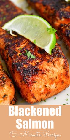 grilled salmon on a white plate with lime wedges