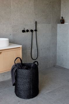 The Dharma Door Baskets and Storage Laundry Basket - Charcoal Charcoal Bathroom Ideas, Iron Rust, Jute Basket, Terrazzo Tiles, Kitchen Paper, How To Make Rope, Plastic Trays, Bath Or Shower, Laundry Storage