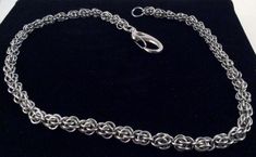 This piece is handcrafted in Stainless Steel 16 gauge rings. The rings were saw cut for the cleanest look. All rings were tightly closed with toothless pliers which, keeps the rings smooth and free from marks. This Wallet Chain is woven in a Fieldstone style and can be made in any size you wish. If you do not see something offered exactly how you want, please message us and we will custom make any piece for you. Thank you for viewing Everyday Metal Link Jewelry, Handmade Silver Bracelet For Everyday Use, Handmade Silver Bracelets For Everyday Use, Handmade Adjustable Chain Link Jewelry, Silver Box Chain Jewelry For Everyday Use, Nickel-free Metal Jewelry For Everyday Use, Everyday Nickel-free Stainless Steel Jewelry, Artisan Silver Jewelry For Everyday Use, Toothless