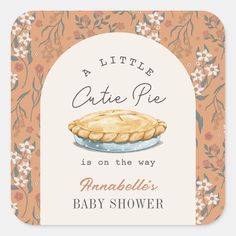 a little cutie pie is on the way baby shower sticker with an orange background