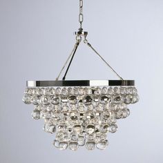 a crystal chandelier hanging from a ceiling