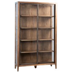 a wooden bookcase with glass doors on the front and bottom shelves, against a white background