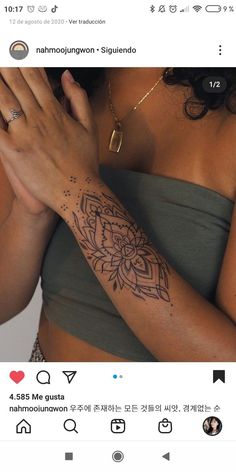 a woman with a tattoo on her arm