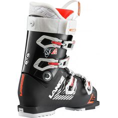 a pair of black and white ski boots with red accents on the soles, side view