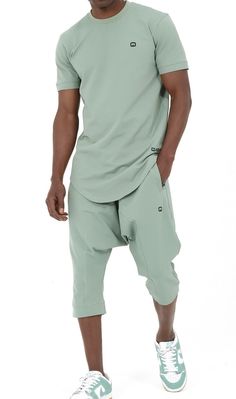 QL Relaxed Fit Nautik Set in Almond Green Description:Enjoy the warmth of summer with a fresh new look! This T-shirt and shorts set offers comfort, functionality and style. Featuring a shirt with a round neck and a stylish round hem and a three-quarter shorts that lets you enjoy the sun while keeping covered. This holiday wardrobe is all you need to feel at your best this season. Modern Islamic clothing for men Very high-quality fabric from top brands Short sleeved T-shirt with a small logo on the left chest Shorts with two zipped side pockets and elastic waist Modest Fashion Compliant (Halal Compliant) Details: Materials: 50% cotton; 40% polyester; 10% elastane Style: Casual, Sportswear and Events Care Tips: Wash at 30° Relaxed Fit Sportswear T-shirt For Summer, Casual Summer T-shirt For Leisure, Casual Summer Loungewear Activewear, Casual Fitted Activewear For Summer, Fitted Casual Summer Activewear, Summer Athleisure Tops For Leisure, Green Summer Streetwear Tops, Summer Cotton Activewear, Summer Crew Neck Top For Loungewear