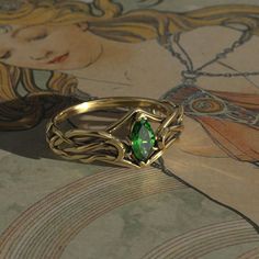 This Art Nouveau Moon themed engagement ring is made from recycled gold and is handmade with a comfort fit to your size. Perfect for the nature lover.  To see our entire Celestial collection, click here: https://www.etsy.com/shop/MetalWendler?ref=seller-platform-mcnav&section_id=50265844 To see variations on this design, click here: https://www.etsy.com/shop/MetalWendler?ref=seller-platform-mcnav&search_query=marquise+moon Ring Specs: ● 7x3.5mm Marquise Lab Emerald, ~0.3ct (Cut weight varies slightly). ● Metals: Silver or gold. This ring is available with different metals, message me about your idea.  ● Widest point of ring is 9.2mm at the top, and tapers down to about 1.8mm at the back.  ● Sizing: It is important for gold that you provide your EXACT finger size. Each ring is handmade to y Fantasy Wedding Rings, Moon Engagement Ring, Rpg Icons, Engagement Ring Marquise Cut, Elven Ring, Art Nouveau Engagement Ring, Earth Ring, Engagement Ring Marquise, Art Nouveau Ring