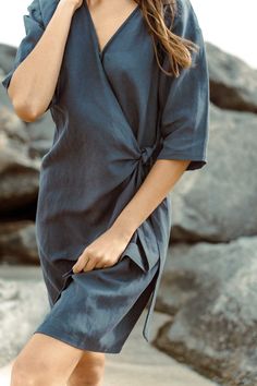 Effortlessly transition from beachside bliss to everyday chic with our Linen Wrap Dress. Crafted from a luxurious linen blend fabric, it boasts a breezy feel perfect for sunny days. Versatile enough to wear as a beach cover-up or an everyday dress, its timeless style and lightweight design make it a must-have staple for any wardrobe. Enjoy comfort and elegance wherever you go with our versatile Linen Wrap Dress. Casual Linen V-neck Beach Dress, Spring Linen Beach Dress For Day Out, Linen Beach Dress For Spring Day Out, Spring Day Out Linen Beach Dress, Bohemian Linen Dress For Summer, Bohemian Linen Dress For Summer Day Out, Relaxed Linen Beach Dress, Chic Linen Beach Dress For Spring, Chic Flowy Linen Dress