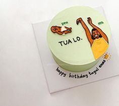 a birthday cake with an image of a man holding a dog on it's back