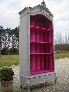 a pink and grey bookcase is on sale for $ 3, 500 at the grand illusion