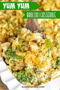 broccoli casserole in a white dish with a wooden spoon on it