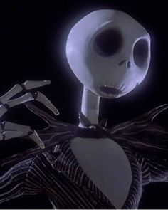 an animated skeleton holding a heart in the dark