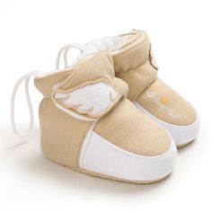 Cute Cream Non-slip Booties, Cute Non-slip Slip-on Booties, Cute Slip-on Non-slip Booties, Cute White Slip-on Booties, White Slip-on Cute Booties, Cute Brown Non-slip Booties, Cute Cream Booties With Soft Sole, Cute High-top Booties With Soft Sole, Cream Booties With Round Toe For Playtime