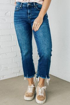 The Theo frayed crop jeans will be your go-to for any occasion! These ultra-chic jeans boast a stylish kick flare, a frayed edge and a dark-wash denim hue. Show off your sass-factor with a cropped hem and have them envy-ing your bold fashion sense! Feel confident and ready to take on anything the world throws your way, while still looking your best. 93% Cotton 5% Polyester 2% Spandex Dark Wash Distressed Jeans Fabric has Some Stretch Frayed Hem Mid-height SIZING: Model is 5'4" wears a 3/26-5/27 Shoes To Wear With Cropped Jeans, Chic Jeans, Jeans Fabric, Boot Jeans, Kick Flares, Crop Jeans, Dark Wash Denim, Boyfriend Fit, Bold Fashion