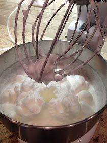 an electric mixer with eggs being whisked