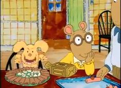 the cartoon mouse is sitting at a table and looking at something in front of him