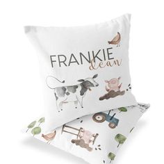 two pillows with farm animals on them and the words frankie dean printed on them