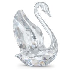 a crystal swan figurine on a white background