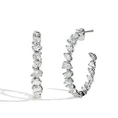 Gorgeous pair of mixed fancy shape diamond inside out hoop earrings featuring emerald cut diamonds, pear shapes, and marquise diamonds in 18k white gold. Pair it with our other Private Label pieces from our Fancy Shape Diamond collection for the perfect look. Fancy Shape Diamond Earrings, Silver Marquise Jewelry With Baguette Diamonds, Marquise Baguette Diamond Jewelry In White Gold, Platinum Jewelry With Baguette Diamonds In Marquise Cut, Platinum Jewelry With Baguette Diamonds And Marquise Cut, Platinum Jewelry With Marquise Cut Baguette Diamonds, Modern Marquise White Gold Jewelry, Diamond Hoops Earrings, Ive Members