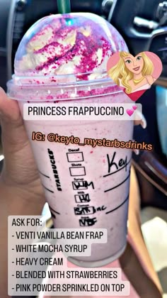 a person holding up a cup with pink sprinkles on it and the words princess