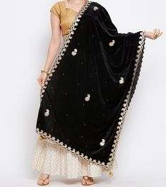 PRODUCT DETAILS  Black & Gold-toned floral embroidered dupatta Gotta Patti, embellished border Size & Fit Length: 2.1 m Width: 0.71 m Specifications- Fabric -Velvet Pattern- Printed Print or Pattern Type - Embroidered Ornamentation -Gotta Patti Occasion - Party Border - Embellished Buyer Note - Before Buy Anything From Our Store Check Our Store Policy SHIPPING - After Receive Payment we will ship your parcel within 2 to 3 Days.  Courier Service - We use Different Types of shipping Courier Services like - Shiprocket (it will take 12 to 14 Days), Aramex Economy (it will take 10 to 14 days), Aramex Express (it will take 4 to 7 days), DHL express (it will take 3 to 5 days), India post (it will take 3 to 4 weeks). Express Shipping Charges - if you want fast you will Pay Extra for Fast Shipping Black Anarkali Set With Embroidered Border For Diwali, Black Anarkali Set With Embroidered Border For Festivals, Designer Embroidered Kundan Dupatta, Black Unstitched Anarkali Set With Embroidered Border, Black Semi-stitched Dupatta For Diwali, Embroidered Black Art Silk Anarkali Set, Black Embroidered Dupatta In Traditional Drape, Black Embroidered Dupatta With Traditional Drape, Black Dupatta With Resham Embroidery In Traditional Drape