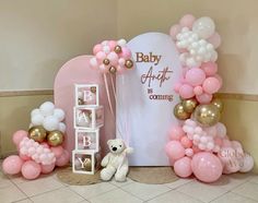 a baby shower is decorated with balloons and teddy bears