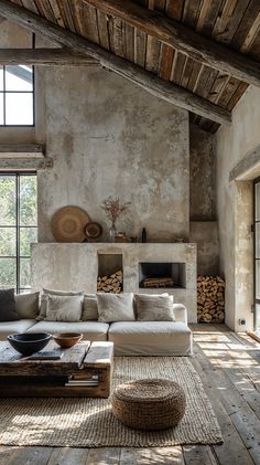 a living room filled with furniture and a fire place