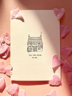 a card with the words you are home to me on it surrounded by pink hearts