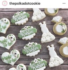 decorated wedding cookies are arranged on a wooden table with the words bride and groom spelled in green