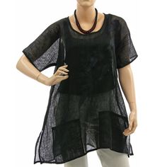 Ready to ship. Very beautiful, stylish linen tunic - this piece is seasonless and you can wear it all year round. A-line shape, 1/2 batwing sleeves, round neck, sideslits and two pockets at the front. Black fine, soft linen gauze - all around bordered with black linen ribbon. Decorated with charming falling leaves appliqués. Very nice for everyday wear, for your holiday - but also for a party or for going out. Great and very fine linen fabric - becomes ever softer and beautiful with time. There Black Bohemian Linen Dress, Black Bohemian Linen Summer Dress, Black Bohemian Linen Dress For Summer, Casual Black Linen Beach Dress, Casual Black Linen Vacation Dress, Black Lagenlook Tops For Summer, Black Short Sleeve Tunic For Summer, Black Short Sleeve Summer Tunic, Casual Black Tunic For Vacation