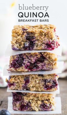 blueberry quinoa breakfast bars stacked on top of each other