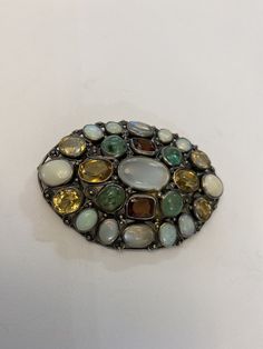 Vintage Antique Multi Color Gem Stone Sterling Silver Brooch . Shipped with USPS First Class Package.a magnificent old brooch , it has multi colored gems , there is natural emeralds , opals , citrine , garnets moonstones , condition is excellent, very well made , it is a unique piece, it is 2 1/2 inches long and weights 25 grams , thank you for watching Sterling Silver Brooch, Colored Gems, Silver Brooch, Gem Stone, Natural Emerald, Moon Stone, Vintage Watches, Multi Colored, Citrine