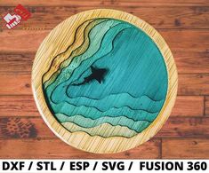 a wooden plate with a shark in the ocean on it's side and text saying dxf / stl / esp / svg / svg / fon / fuson 360