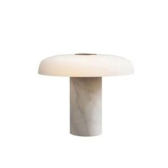 an image of a white table lamp on a white background in the shape of a mushroom