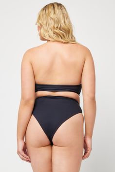 *ONLINE EXCLUSIVE* COLOR: Black Flattering in fit, the Arlo Bikini Bottom is a classic high waist bottom with shirring on the hips and just the right amount of coverage. ﻿SWIRL STYLIST NOTE* ﻿Try pairing the Arlo Bikini Bottom with matching Van Damme Bikkini Top for the perfect pool day look! ﻿DETAILS + CARE: High Waist Bottom Shirring Along Hips Size XS-XL 80% Nylon, 20% Spandex Like all delicates, shape, color and fit are best preserved if hand washed in cold water. Lay flat to dry. Style # LS Fitted High Rise Swimwear For Swimming, Wide Waistband High-rise Swimwear For Pool, High Rise Elastane Swimwear, Poolside High Waist Bra-friendly Tankini, High Rise Swimwear With Wide Waistband For Poolside, Black High Rise Swimwear For Swimming, High Rise Black Swimwear For Swimming, Fitted High Rise Swimwear For Beachwear, High Rise Swimwear With Wide Waistband