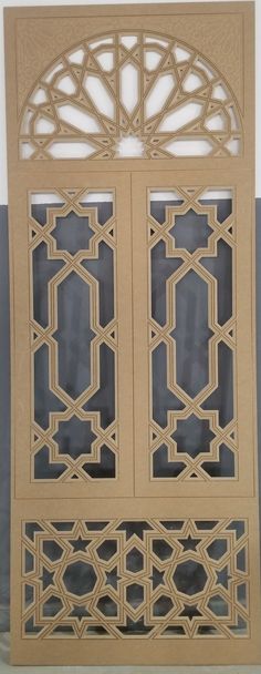 an intricately designed cabinet with glass doors on the front and side panels, made out of cardboard