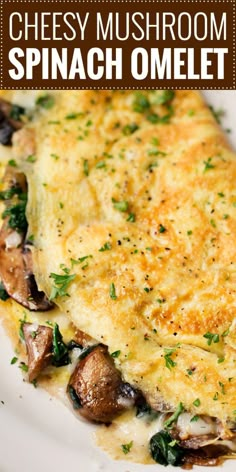 cheesy mushroom spinach omelet on a white plate with mushrooms and parsley