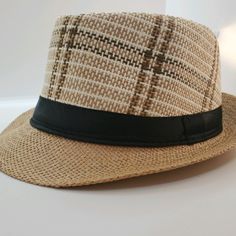 New-Never Worn Fedora Style Hat With Tan, White And Brown Pattern And Black Sash Trendy Brown Fedora For Day Out, Casual Brown Fedora For Spring, Casual Brown Fedora, Casual Brown Straw Hat For Day Out, Casual Beige Fedora One Size Fits Most, Casual Beige Fedora, Fedora Style, Brown Pattern, Black Tan