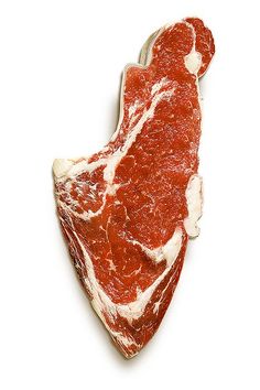 a piece of raw meat is shown on a white background with red and white markings