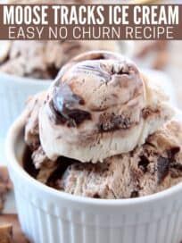 two bowls filled with ice cream on top of a wooden table